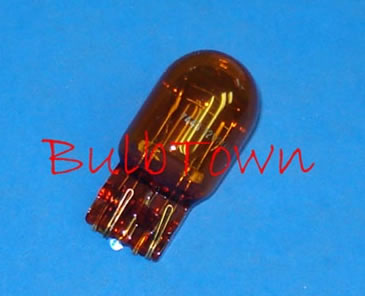  #7443NA NATURAL AMBER MINIATURE BULB GLASS WEDGE BASE - 13.5 Volt 1.85/0.40 Amp T-6 Natural Amber Glass Wedge Base, 35 MSCP, C-6 Filament Design. 500/1,000 Average Rated Hours, 1.85" Average Overall Length 